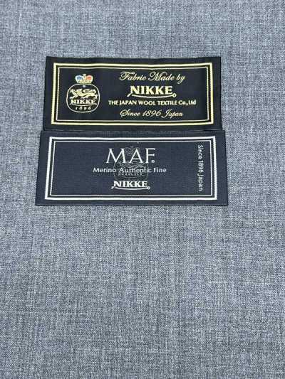 896S2001-014 NIKKE MAF xám nhạt trơn